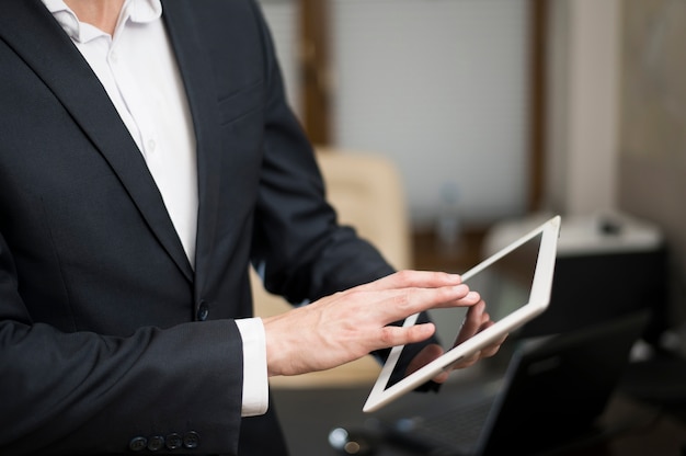 Businessman working on tablet